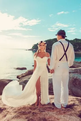 lace and chiffon beach wedding dress with thigh high slit and off the shoulder straps
