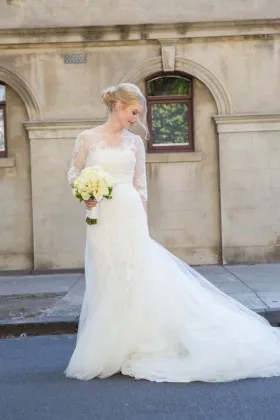 Classic ivory lace and tulle mermaid chapel train wedding dress with 34 sleeves
