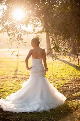 Lace up low back asymmetrical beaded drop waist organza trumpet wedding gown