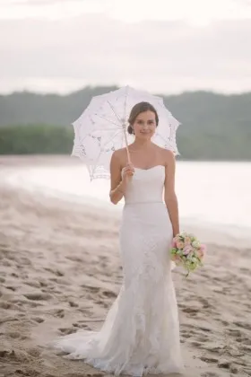 Romantic ivory lace strapless mermaid long beach wedding dress