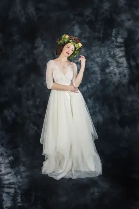 Ivory lace and tulle scalloped V neckline 34 sleeve whimsical bridal gown