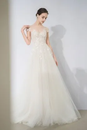 Ethereal fairytale tulle wedding dress with illusion floral appliques