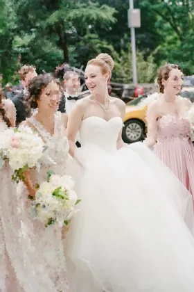 Beautiful white tulle strapless sweetheart ballgown wedding dress with chapel train