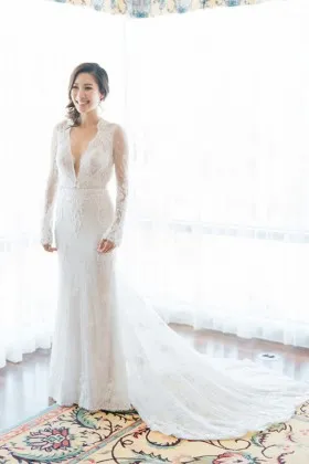 scalloped plunging V neckline illusion long sleeve mermaid lace wedding dress