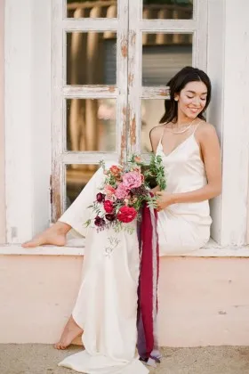 Ivory satin V neck open back with spaghetti straps long ethereal wedding gown