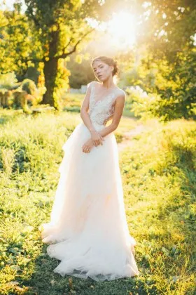 Ivory lace and tulle illusion plunging neckline open V back country wedding dress