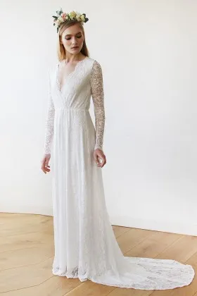 Scalloped plunging V neckline illusion long sleeve lace wedding dress with court train