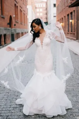 White lace and organza with blush lining modern trumpet wedding gown