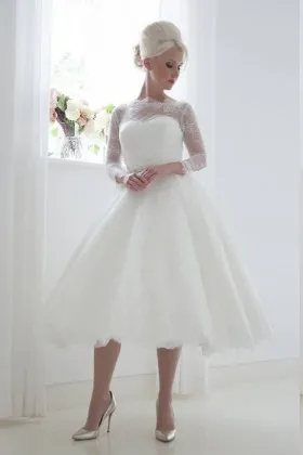 Fabulous illusion lace neckline with 34 sleeve tea length wedding ball gown