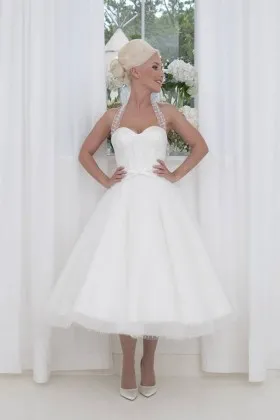 1950s vintage inspired spot tulle and satin tied halter tea length wedding gown