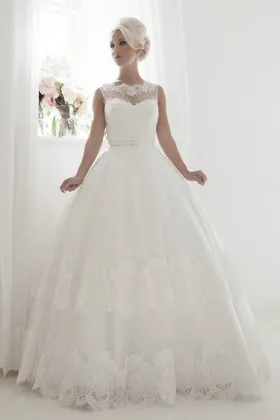 Dramatic illusion sweetheart tulle and lace floor length ballgown wedding dress