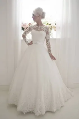 Traditional lace and tulle illusion neckline long sleeve ballgown wedding dress