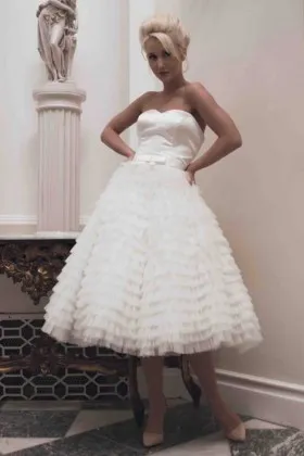 tiered ruffle tulle and satin strapless tea length wedding gown
