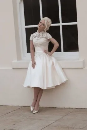1930s vintage inspired sophisticated lace and satin tea length wedding dress